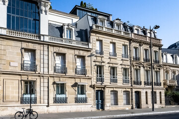 Paris, beautiful building rue de Prony, in the 8e arrondissement - obrazy, fototapety, plakaty