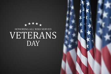 American flags with Text Veterans Day Honoring All Who Served on black background. American holiday banner.