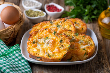 Turkish Egg Breads. It is called "Yumurtali Ekmek" in Turkish. French Toast. Turkish and Arabic Traditional Breakfast Baked or Fried Egg Bread. Egg bread with cheese and parsley.