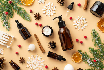Winter season skincare concept. Top view photo of cosmetic bottles christmas ornaments baubles...