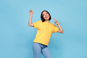 Photo of young adorable pretty cute japanese woman dancing interested look fingers pointing empty...