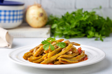 Traditional delicious Turkish food; Green beans with olive oil; Turkish name; Zeytinyagli taze fasulye