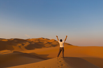 UAE. Man in desert © erainbow