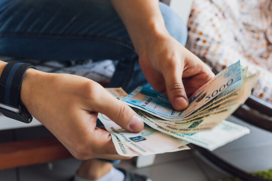 Russian rubles in the hands of a business man.