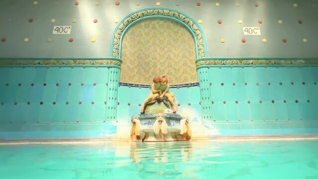 The fountain with salt deposits in thermal bath of Gellert Spa Baths, Budapest, Hungary