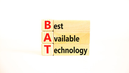 BAT best available technology symbol. Concept words BAT best available technology on wooden blocks on a beautiful white background. Business and BAT best available technology concept. Copy space.