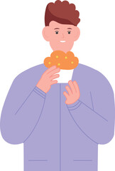 Boy eating muffin. Young man with sweet bakery