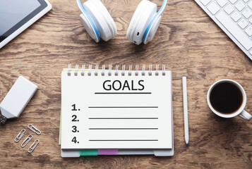  Goals and list in the notepad. Business concept