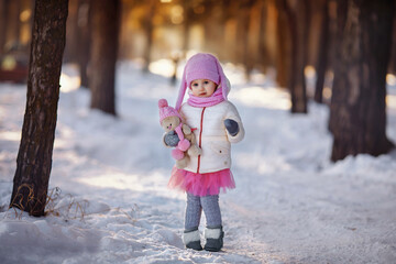 Charming little girl in a warm coat.