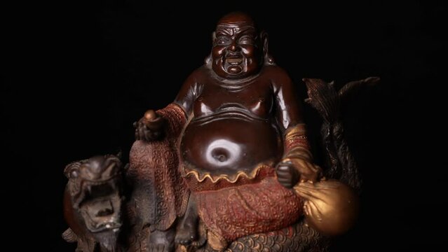 Glücksbuddha - lachender Buddha - Happy Buddha auf Drache aus Bronze