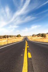 Asphalt road and countryside landscape