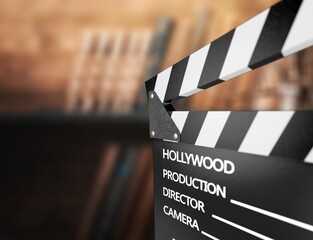 Set od books and Movies slate on the desk