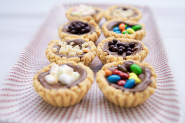 Cheese tart, chocolate tart, strawberry tart and various types of tarts are served to be eaten on Eid.