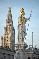 Pallas Athena statue Austrian Parliament and Rathaus tower in Vienna