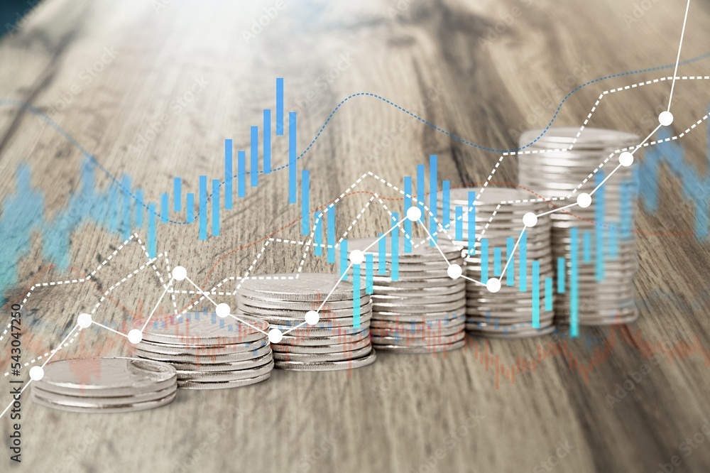 Poster stack of coins with graph or chart on the desk