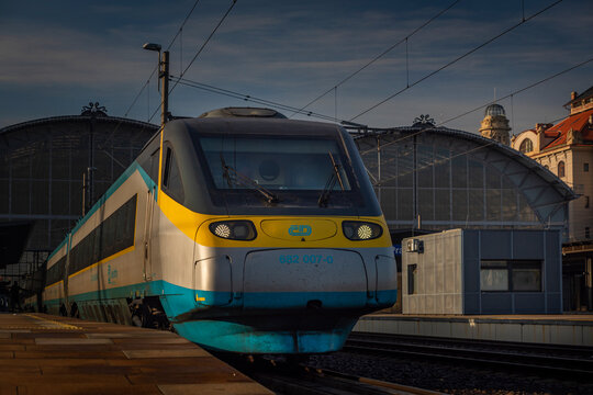Super fast train in color of Czech republic on Prague main station evening