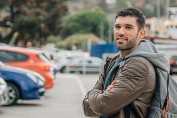 Fototapeta premium urban man with backpack in the city street