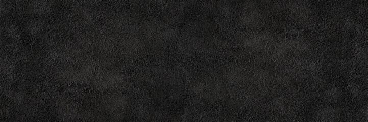 Black suede close-up. Natural black suede texture for design or project. Velvet, leather reverse.