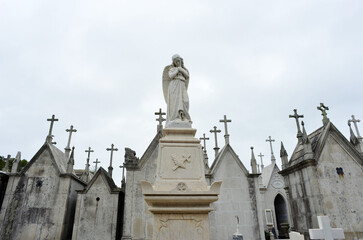Fototapeta na wymiar Angle figure on a cementery in Portugal