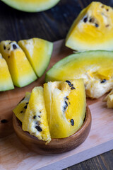 Ripe and juicy yellow watermelon cut into pieces