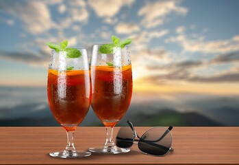 Tasty cocktail drinks on the desk with outdoor background