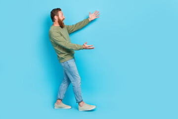 Full body photo of attractive young guy excited stretching arms meet old friend cuddle wear khaki clothes isolated on cyan color background