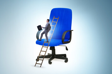 Businessman in the career concept climbing chair