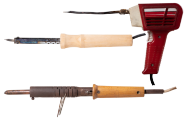 Three different soldering irons for minor repairs in electronics on an isolated background.