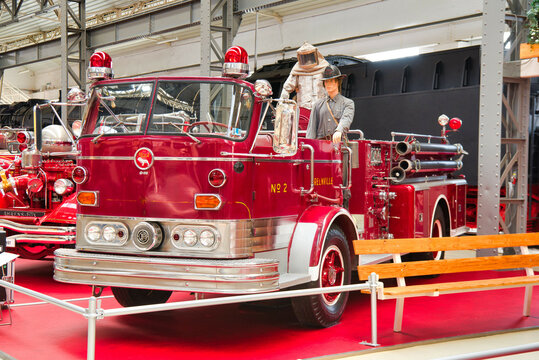 SPEYER, GERMANY - OCTOBER 2022: red MACK PUMPER C75 1961 retro fire truck in the Technikmuseum Speyer