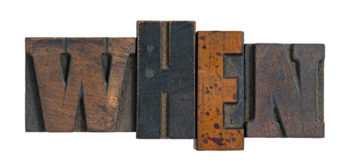 Isolated word when spelled out in wooden vintage letterpress type printing blocks