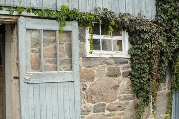 Fototapeta na wymiar Rustic antique historic stone barn in Aurora, Ontario, Canada.