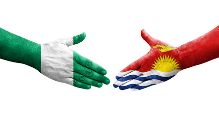 Handshake between Kiribati and Nigeria flags painted on hands, isolated transparent image.