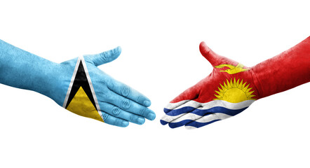 Handshake between Kiribati and Saint Lucia flags painted on hands, isolated transparent image.