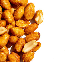 Sweet honey roasted peanuts on a white background with copy space