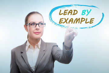 Businesswoman in lead by example concept