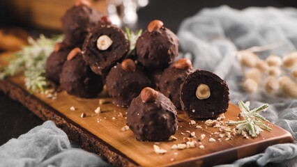 Dark chocolate truffles with hazelnuts