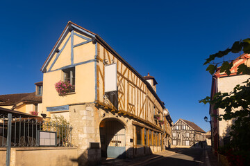 Fototapeta na wymiar View of ancient half-timbered residential houses in old town of Provins on sunny summer day, France.