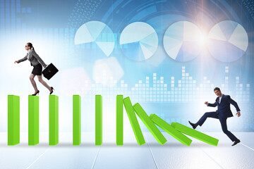 Business people in domino effect concept