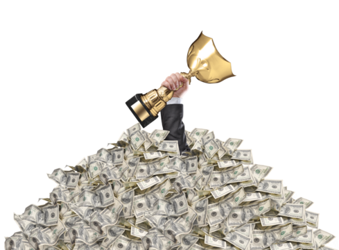 hand of a man stuck in a pile of money holding a cup trophy above the surface