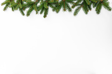 Green fir branches for Merry Christmas garland on white background. Happy New Year and Xmas, top...