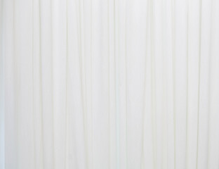 Obraz premium White curtains have soft, flowing waves.