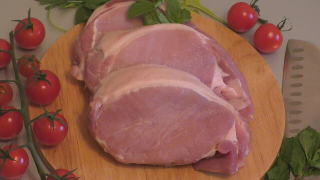 Layers of meat sliced from pork tenderloin for cooking escalope