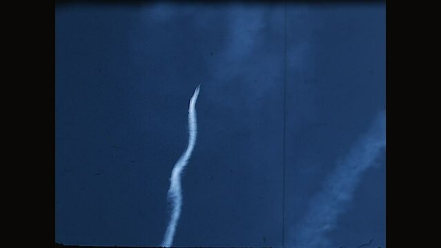 Rolling Fighter 1968 - An F100 Super Sabre Jet squadron perform a synchronised roll