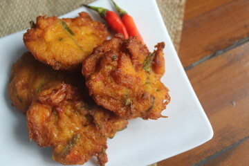 Corn cakes or also called bakwan corn is a food made from corn, flour, chicken eggs, and fried.  This food comes from Indonesia