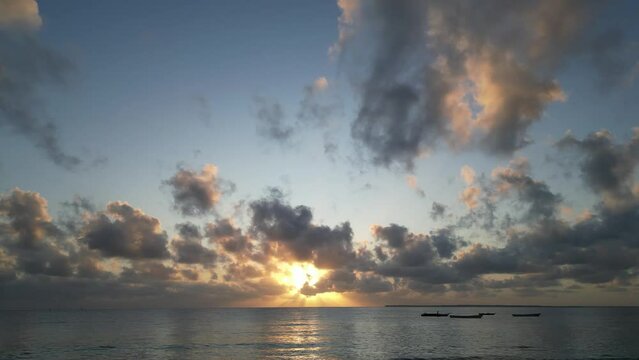 Rolling clouds and sunset timelapse at Uroa Beach in Zanzibar Tanzania Africa, Static timed shot