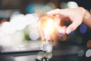 innovative technology in science and communication concepts,Technology creativity for future inventions and developments,Business for innovative solution concept,the light bulb is on the desk
