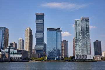 New York City buildings viewed from the river on a lovely summer day