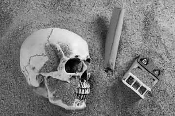 Death Skull under sand beach isolated with last will inheritance or treasure map. Finance Property...