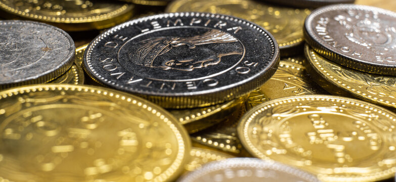 Macro photography of honduran cents with different denominations.