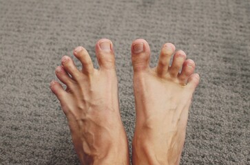 wide sport man  feet fingers closeup
